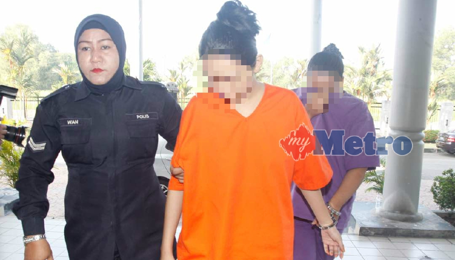 ANGGOTA polis mengiringi suami isteri berusia 22 tahun ke Mahkamah Majistret Bukit Mertajam untuk direman dipercayai atas tuduhan mendera bayinya yang baru berusia 47 hari di rumahnya di Kampung Tok Panjang, Bukit Tengah, Pulau Pinang. FOTO Amir Irsyad Omar