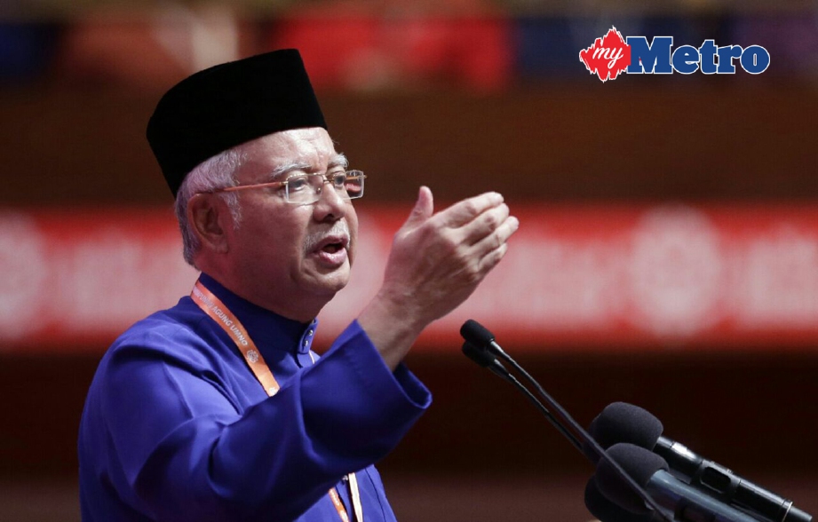 Presiden UMNO, Datuk Seri Najib Razak menyampaikan ucapan pada Majlis Perasmian Perhimpunan Agung UMNO ke-70 di Pusat Dagangan Dunia Putra (PWTC), Kuala Lumpur. FOTO Aizuddin Saad