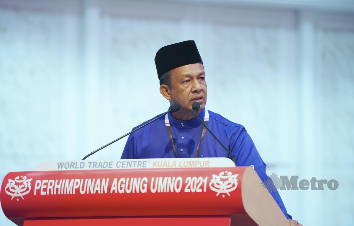Wakil pembahas Negeri Terengganu, Bazlan Abd Rahman berucap pada Perhimpunan Agung U2022MNO 2021 di Dewan Merdeka Pusat Dagangan Dunia, Kuala Lumpur. FOTO IHSAN UMNO