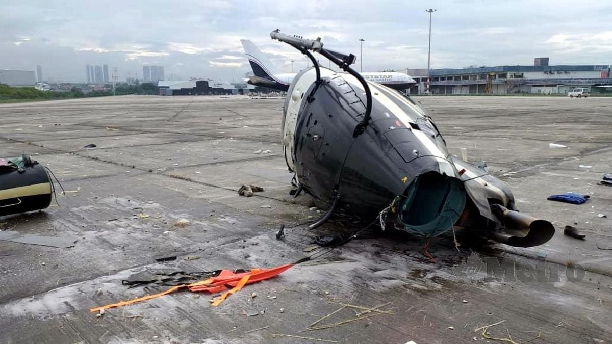 Helikopter jenis Airbus H125 yang terhempas di kawasan kargo Lapangan Terbang Sultan Abdul Aziz Shah, Subang menyebabkan seorang juruterbang dan pembantunya cedera manakala tiga penumpang terselamat. FOTO IHSAN BOMBA SELANGOR