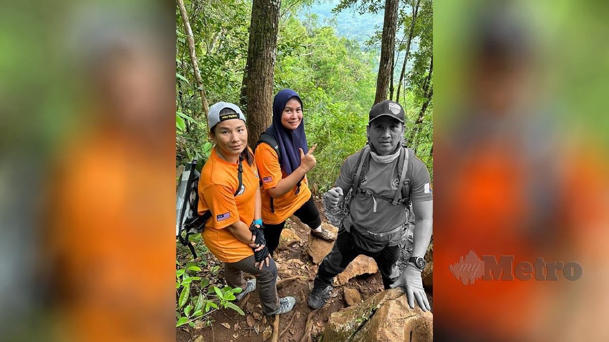 Allahyarham Leftenan Kolonel (PA) Awang Askandar Ampuan Yaacub (kanan) bersama dua pegawai bersekutu APM Kedah ketika melakukan pendakian di sebuah gunung di Kedah baru-baru ini. FOTO IHSAN APM