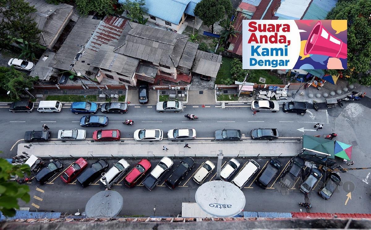 TINJAUAN masalah tempat letak kenderaan dihadapi penduduk Pangsapuri PKNS, Jalan Raja Muda Musa, Kampung Baru. FOTO AMIRUDIN SAHIB