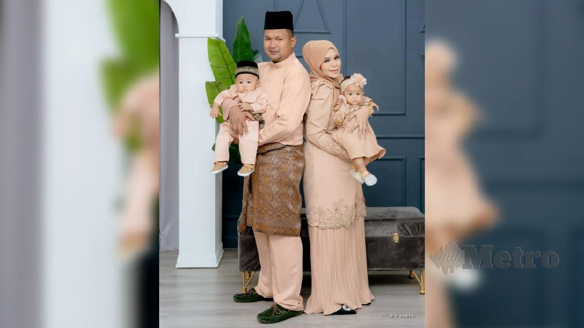 NOORAIN Seman dan Mohd Ridzuan Azis bersama bayi kembar mereka. FOTO Ihsan Noorain