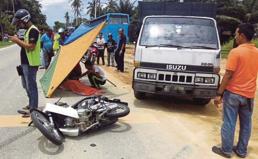 R BUNIAH yang menunggang motosikal maut di tempat kejadian.