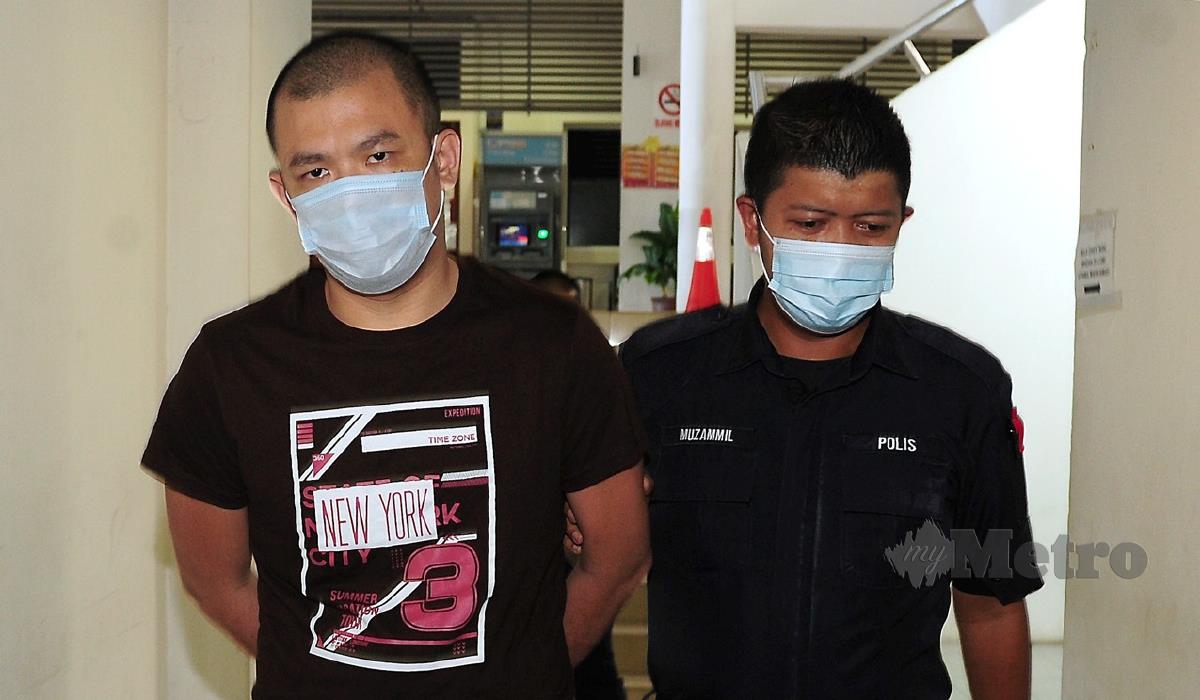 Cheng Kui Fat, 29, (kiri) yang menghadapi pertuduhan mengedar dadah sebelum ini terlepas hukuman gantung selepas Mahkamah Tinggi di sini hari ini meminda pertuduhan kepada memiliki dadah jenis ketamin. FOTO BERNAMA