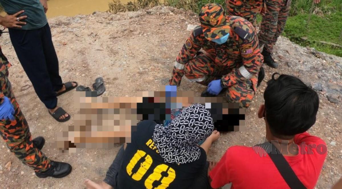 Mohd Hakimi Nor Izzudin, 11, dikatakan terjatuh Sungai Kinta sebelum disahkan meninggal dunia ketika sedang bermain bersama dua rakannya dalam kejadian di Taman Desa Pelancongan, Pasir Puteh, di sini, hari ini. FOTO  Ihsan JBPM Perak