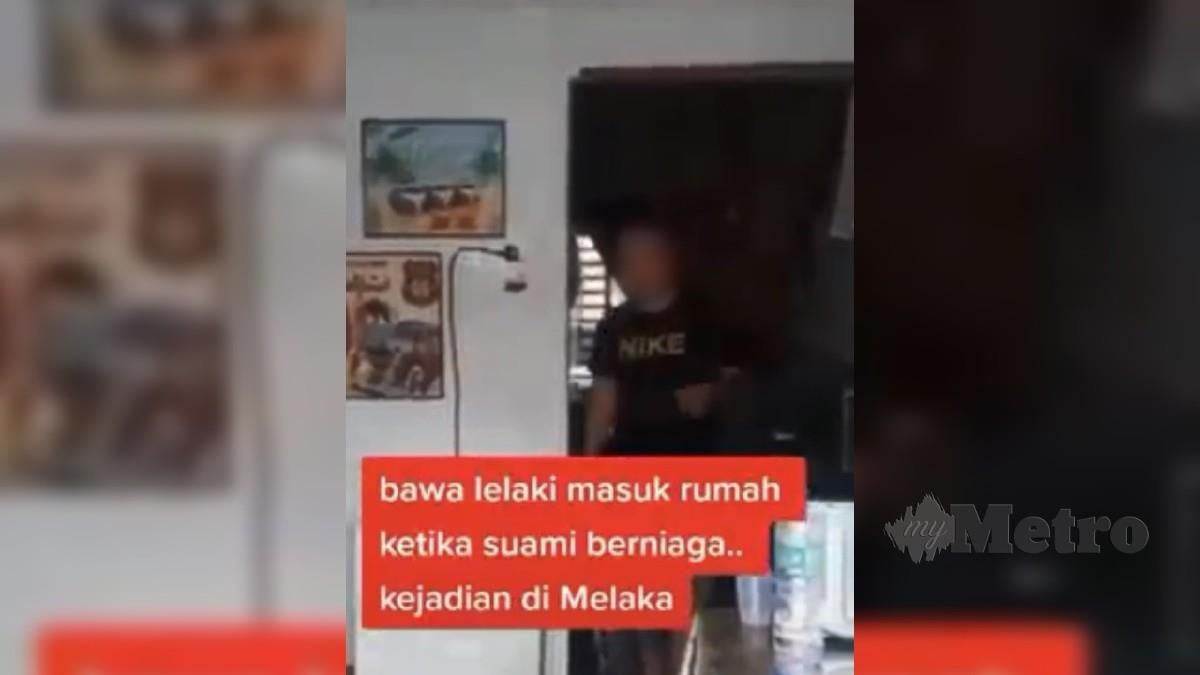 Tangkap layar video tular wanita ditangkap khalwat dengan pasangannya yang didakwa berlaku di Melaka. FOTO Tular
