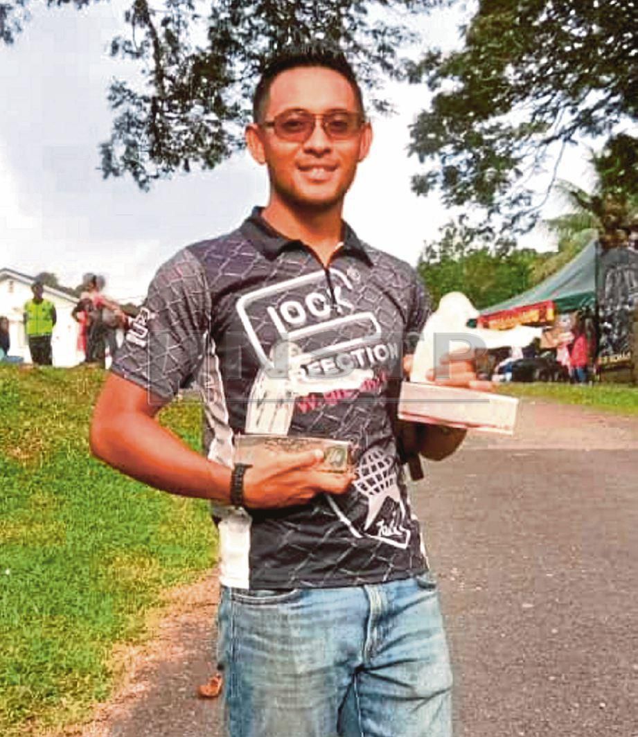 IZAD Zainal  memenangi Kejohanan  Menembak Terbuka PDRM di Ulu Kinta, Perak. NSTP/IHSAN KOLEKSI IZAD