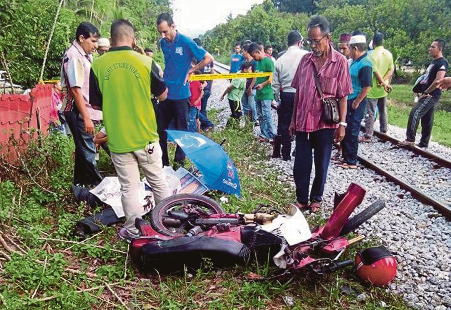 MANGSA  yang maut dilanggar kereta api ketika melintas landasan, semalam.  