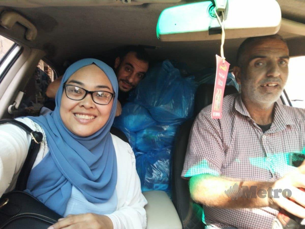 Nurul Ain dan suami masih meneruskan aktiviti menyalurkan bantuan kepada penduduk di Gaza. FOTO Nurul Ain