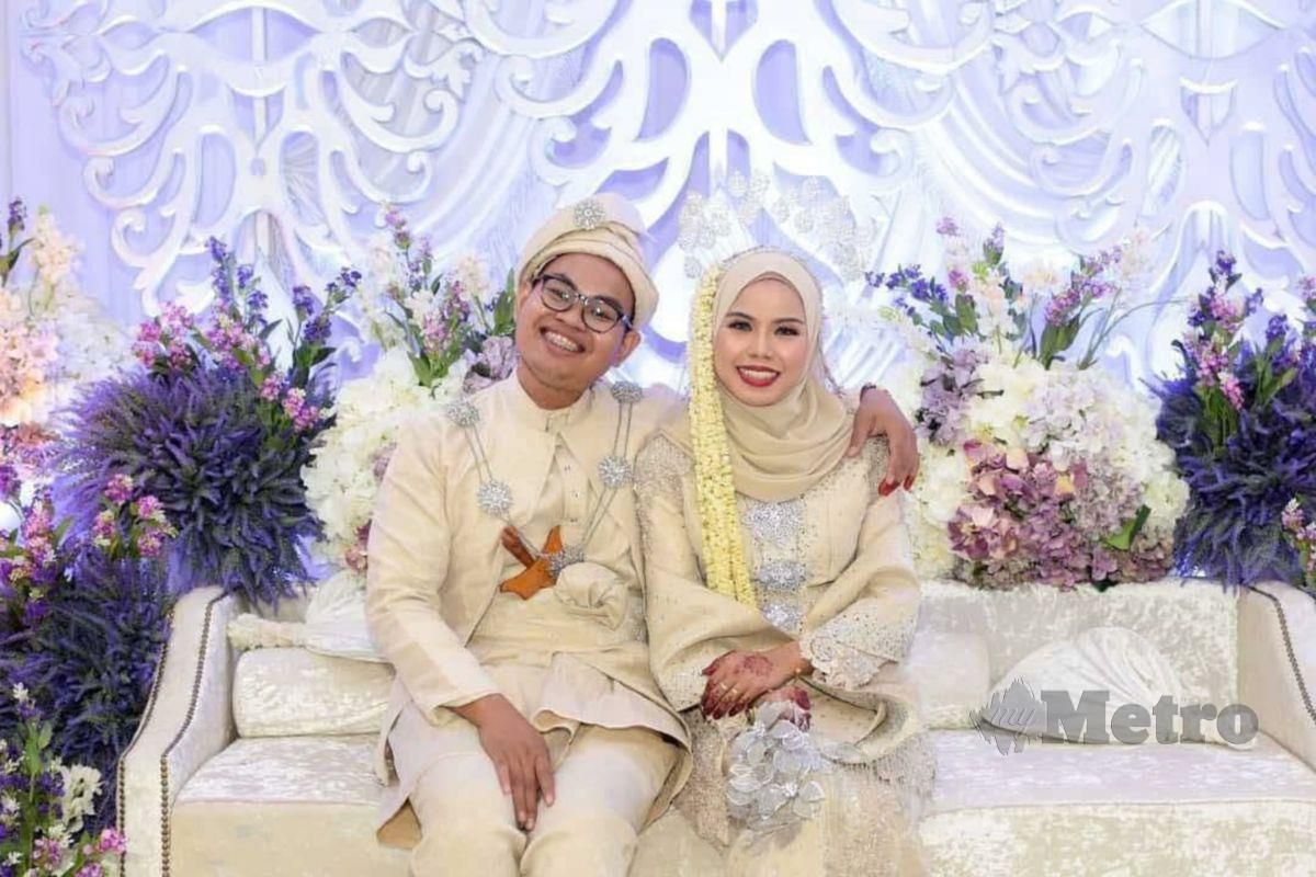 GAMBAR perkahwinan Muhamad Hamidi Fikri dan isterinya, Norliza. 