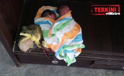 MAYAT dua bayi ditemui dalam almari. Foto ihsan Pembaca