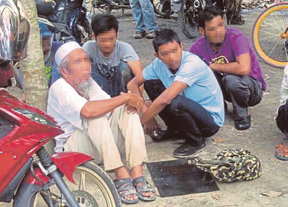 SUSPEK kes dadah ditahan dalam serbuan di Kampung Datuk Syed Ahmad, semalam. 