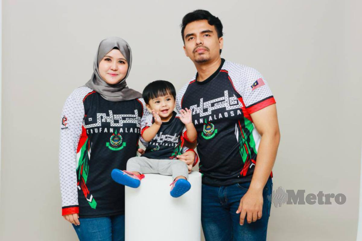 MOHAMAD Azwaan Jamil dan isteri, Nur Syahidah Abdol Rahman bersama anak mereka, Rayyan Uqayl. FOTO Ihsan Nur Syahidah Abdol Rahman