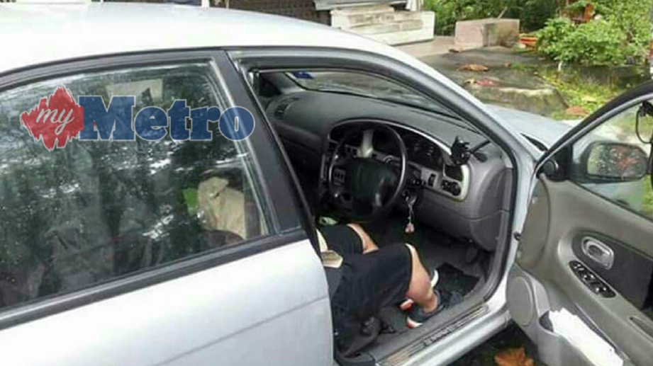 KEADAAN wanita yang ditemui mati di tempat duduk pemandu dalam kereta Kia Spectra, pagi tadi, di Persiaran Pulau Pinang, Jalan Meru, Klang. FOTO Ihsan Pembaca