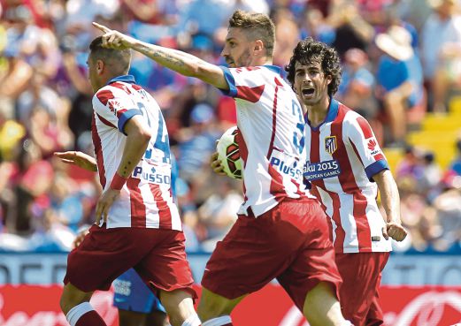 Siqueira (tengah) ledak gol pertama bersama Atletico.