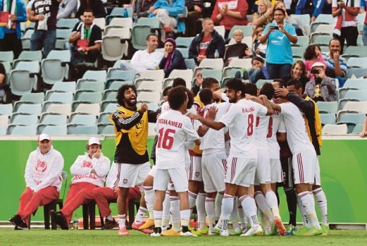 PEMAIN UAE meraikan kemenangan mereka.