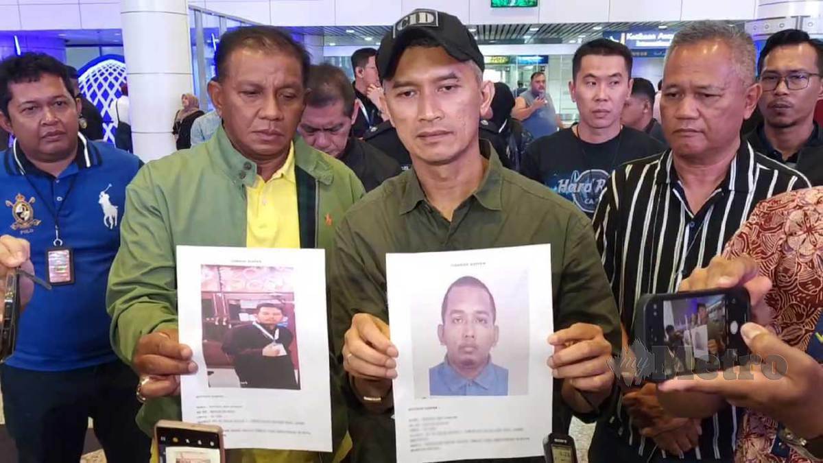 MOHD Shuhaily (tengah) menunjukkam wajah suspek pada sidang media di KLIA Terminal 1. FOTO Mohd Haris Fadli Mohd Fadzil