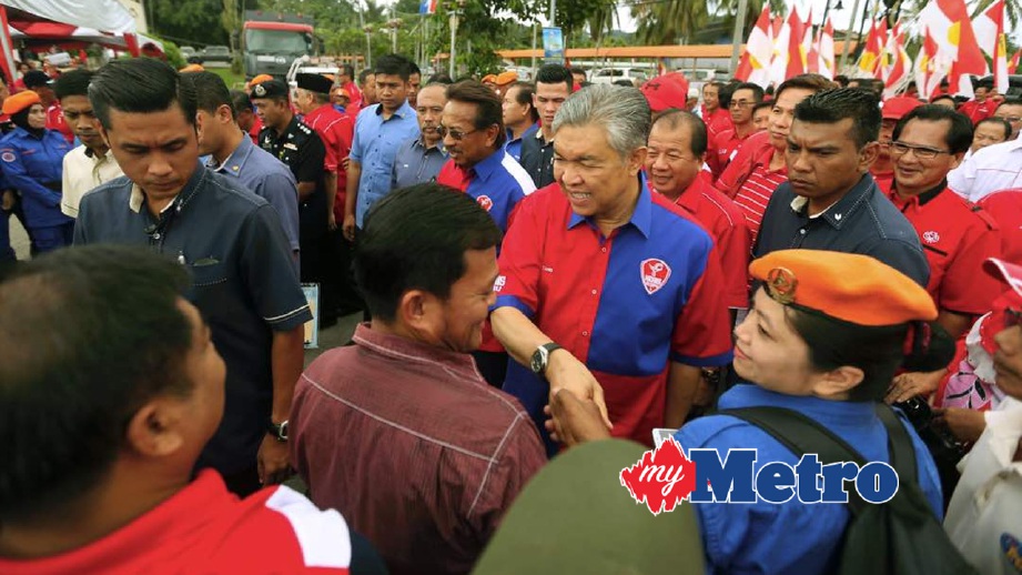 AHMAD Zahid diiringi Musa Aman di Majlis Pemimpin Bersama Rakyat. FOTO Malai Rosmah Tuah