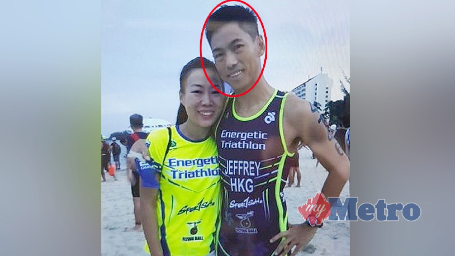 MANGSA,  Tharm Wei Wong (kanan) lemas ketika menyertai acara renang triatlon. FOTO ihsan Polis