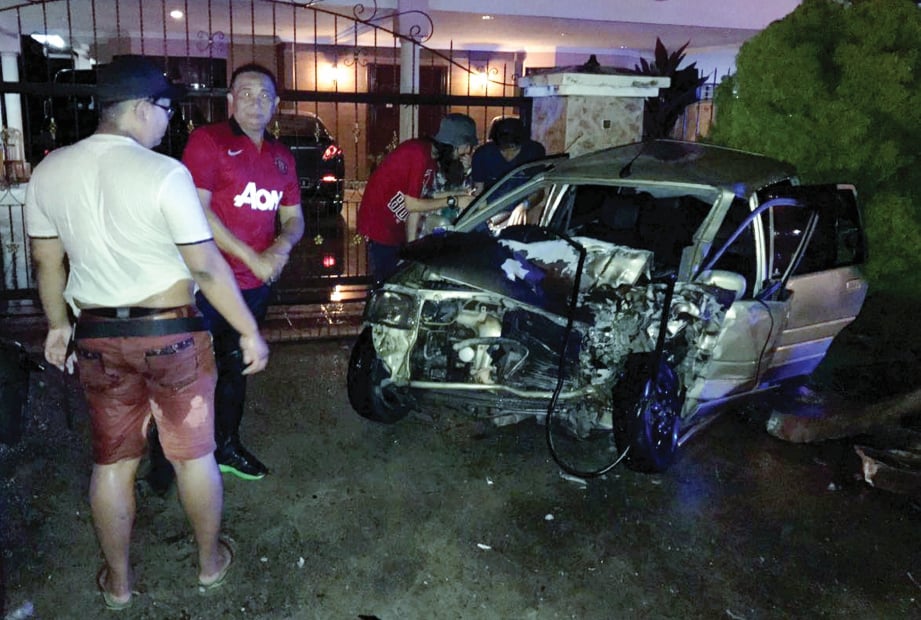 KERETA Perodua Kancil yang dinaiki dua lelaki warga Filipina.
