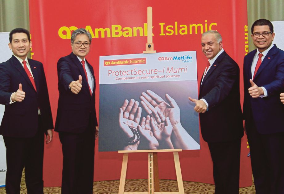 SULAIMAN (dua kiri) pada majlis pelancaran ProtectSecure-i Murni di Kuala Lumpur.