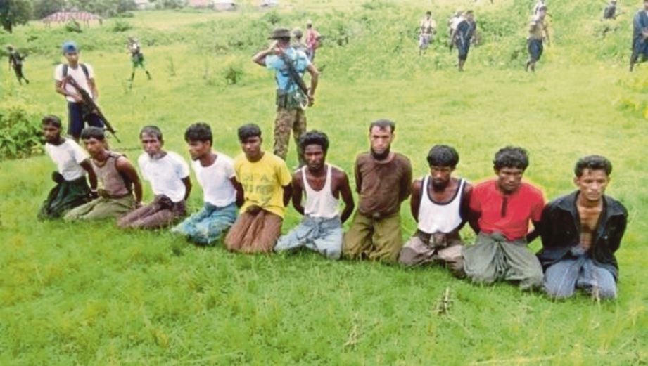 GAMBAR menunjukkan 10 lelaki etnik Rohingya yang dibunuh di Inn Din. - Reuters