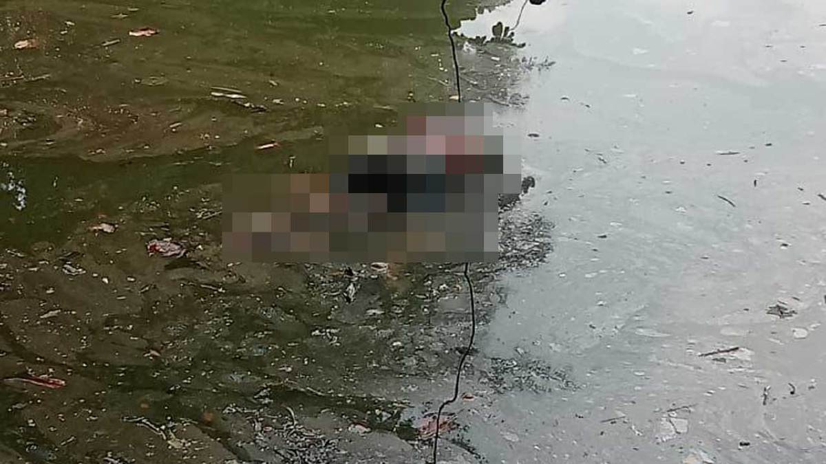 MAYAT lelaki ditemui terapung di Kunci Air Sungai Klang. FOTO ihsan Polis