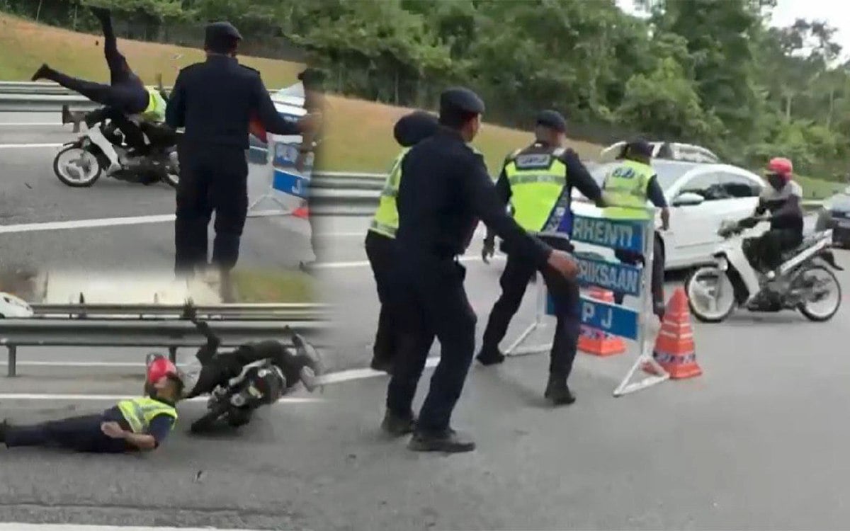 TANGKAP layar daripada video tular menunjukkan anggota JPJ dirempuh penunggang motosikal yang melanggar SJR di Lebuhraya Seremban-Port Dickson.