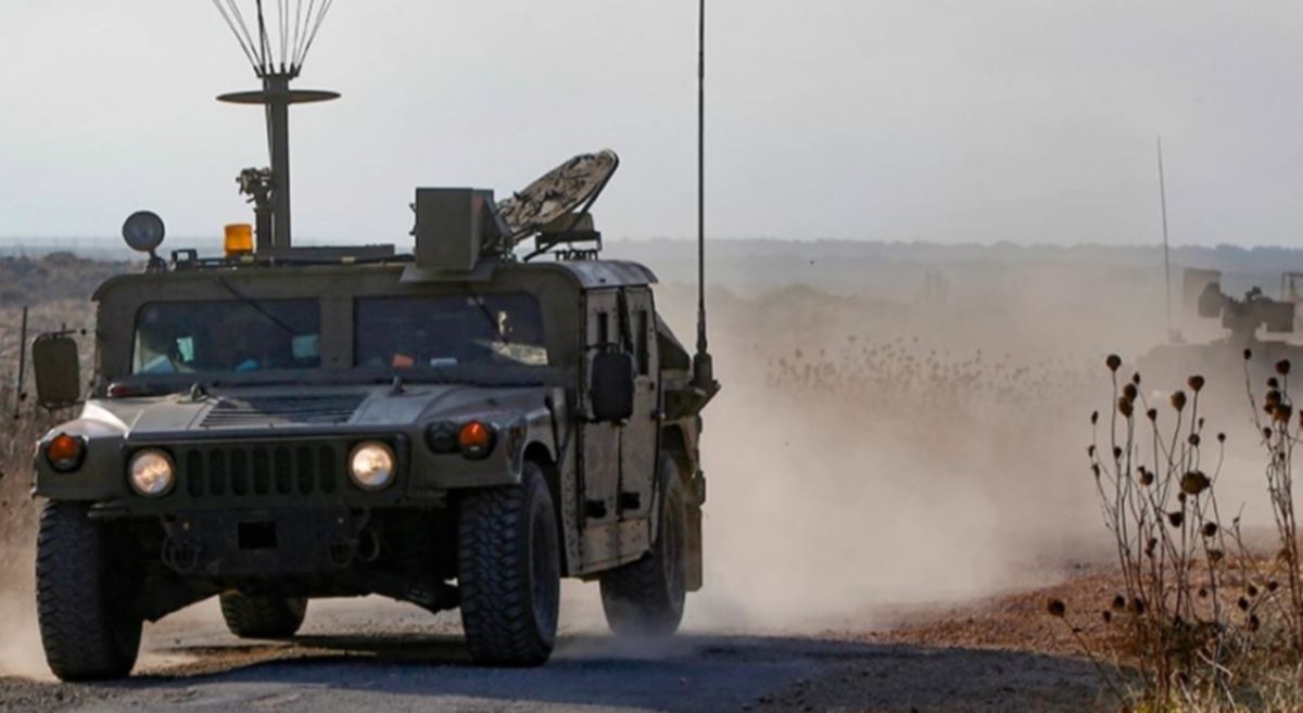 KENDERAAN tentera Israel di kawasan yang dikuasainya di Bukit Golan, berhampiran sempadan Syria. FOTO AFP 