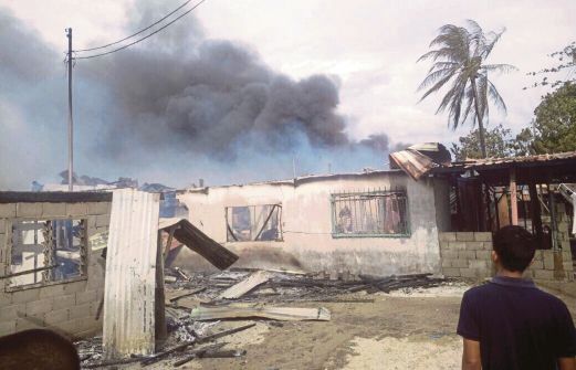 RUMAH Zero (gambar kecil) yang hangus dalam kebakaran di  Kampung Pantai Bahagia.