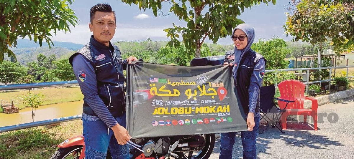 MOHD Rahmat dan Nurazlinda   menunggang  motosikal dalam Kembara Jelebu -Makkah bermula 20 Mac ini. FOTO Abnor Hamizam Abd Manap