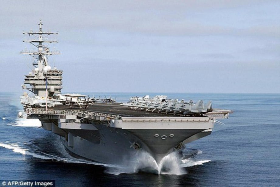 KAPAL pengangkut pesawat USS Ronald Reagan yang turut dikerah ke Semenanjung Korea.  - Agensi 