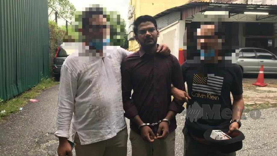 MD Rayhan (tengah) ditahan Jabatan Imigresen bulan lalu.