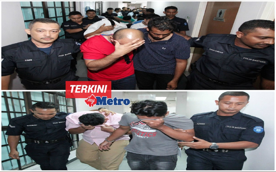 Antara 15 individu termasuk seorang wanita dihadapkan ke Mahkamah Sesyen Johor Bahru, atas tuduhan menjalankan perniagaan pengiriman wang tanpa lesen membabitkan jumlah hampir RM1 bilion, sejak 2012. FOTO Pix Mohd Azren Jamaludin