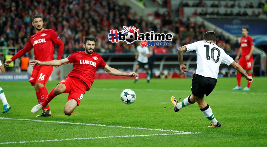 COUTINHO (kanan) jaring gol penyamaan Liverpool.  - Foto REUTERS