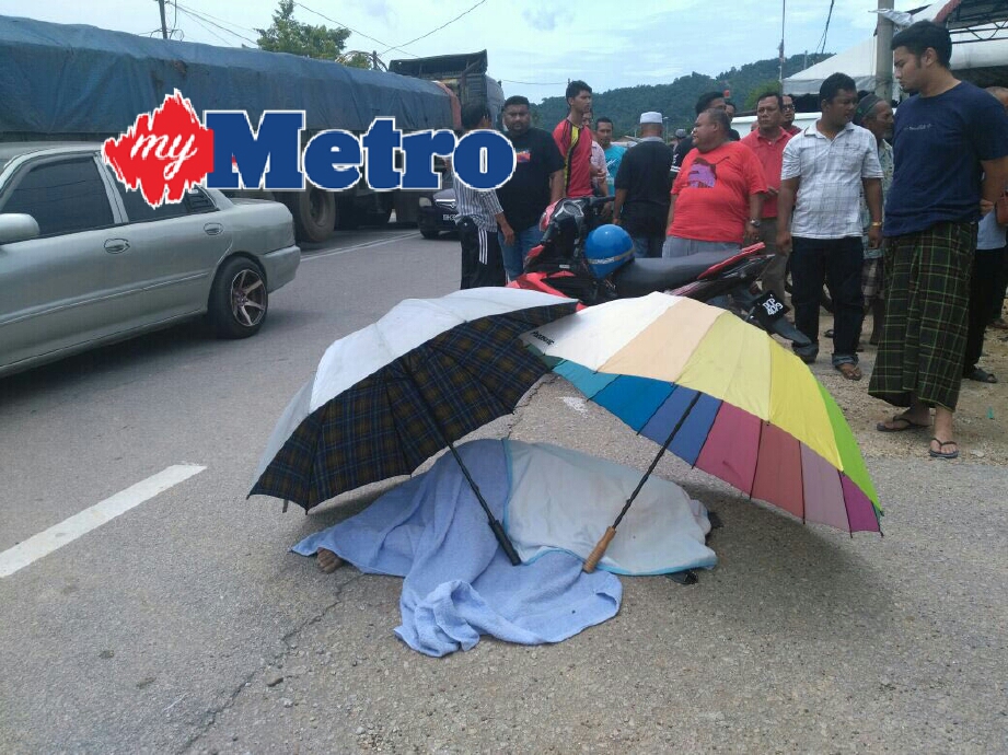 Wanita warga emas maut selepas dilanggar motosikal berhampiran SMK Bukit Jawa, hari ini. FOTO Rokaid Chik