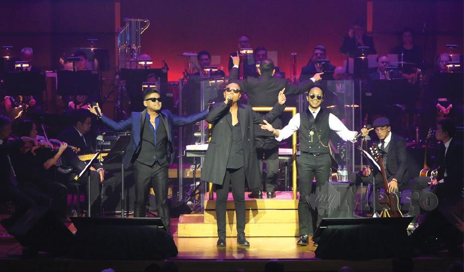 HATTAN, Hazama dan Azlan menghiburkan penonton pada Konsert Rock Tri-O di Dewan Filharmonik Petronas, Ahad lalu.