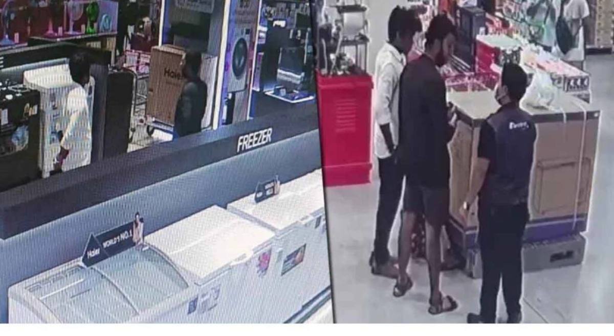RAKAMAN CCTV suspek melihat peti sejuk dalam sebuah pusat beli belah. FOTO Agensi.