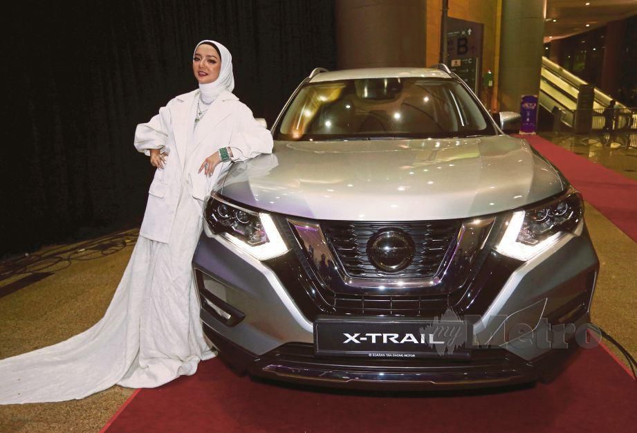 MIRA membawa pulang hadiah utama, kereta Nissan X-Trail 2.0L Hybrid bernilai RM160,000. FOTO Halimaton Saadiah Sulaiman