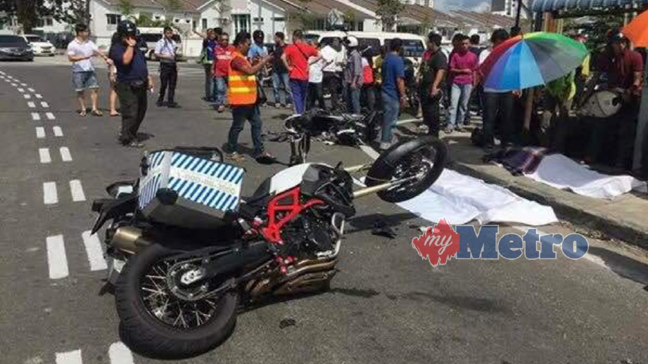 KEMALANGAN motosikal menyebabkan seorang penunggang maut dan seorang lagi cedera. FOTO ihsan pembaca