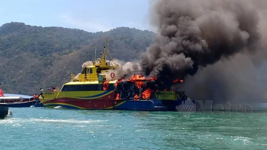 SEBUAH feri penumpang milik syarikat itu yang terbakar di perairan Langkawi, 25 Februari lalu. FOTO Arkib NSTP.