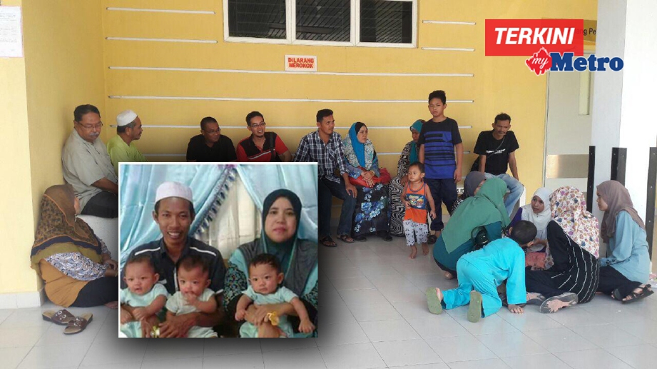 AHLI keluarga dan waris di Unit Forensik Hospital Tampin. Gambar kecil, foto kenangan arwah Mohd Fadzil (kiri) bersama isteri dan tiga anak kembar. FOTO Amran Yahya