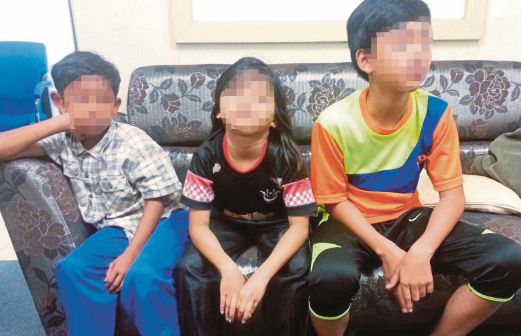 TIGA kanak-kanak yang terselamat  selepas cuba dilarikan di Jalan Bayam, Kota Bharu.