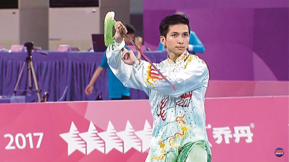 CHOON How beraksi dalam acara Taijijuan pada aksi di Universiade Taipei.