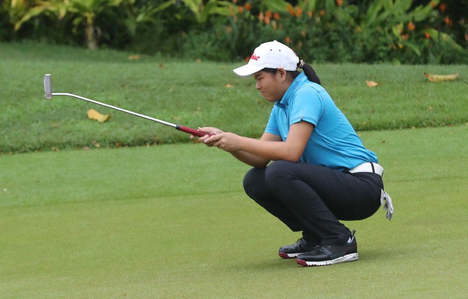 WINNIE  menduduki tempat ke-41 pada pusingan dua kejohanan Golf LPGA Malaysia Sime Darby di TPC, Bukit Kiara. FOTO/OWEE AH CHUN 
