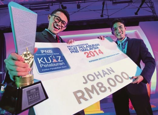 JOHAN Kuiz Pelaburan 1 Malaysia, Muhammad Afiq Hamizan (kiri) dan Muhammad Hafizu. 