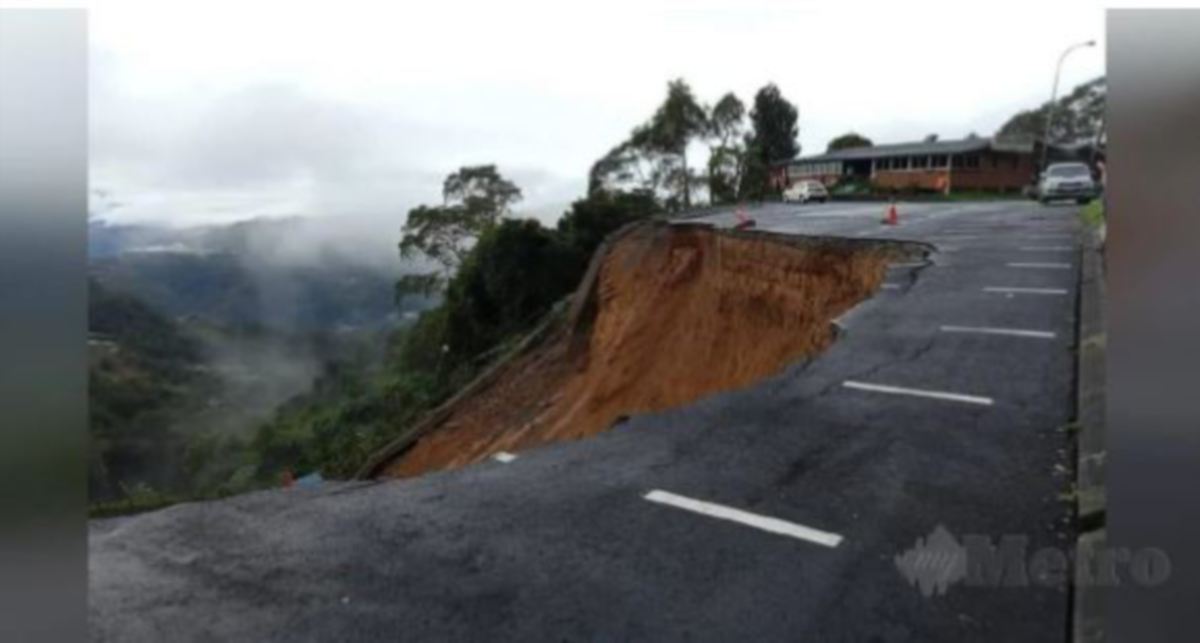 FOTO faill menunjukkan kawasan terjejas akibat tanah runtuh di parkir berhampiran Taman Kinabalu. FOTO Ihsan JKR 