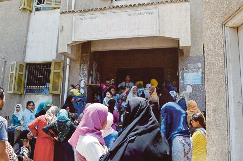  KELAS buta huruf percuma yang disediakan di daerah Gharbiyyah, Tanta, Mesir.  