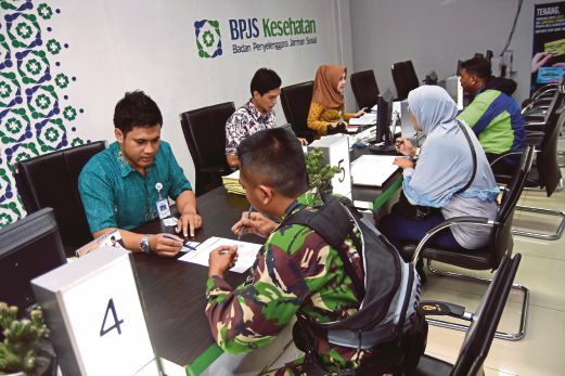  GAMBAR fail menunjukkan proses pendaftaran untuk menyertai program kesihatan anjuran kerajaan di Jakarta. 